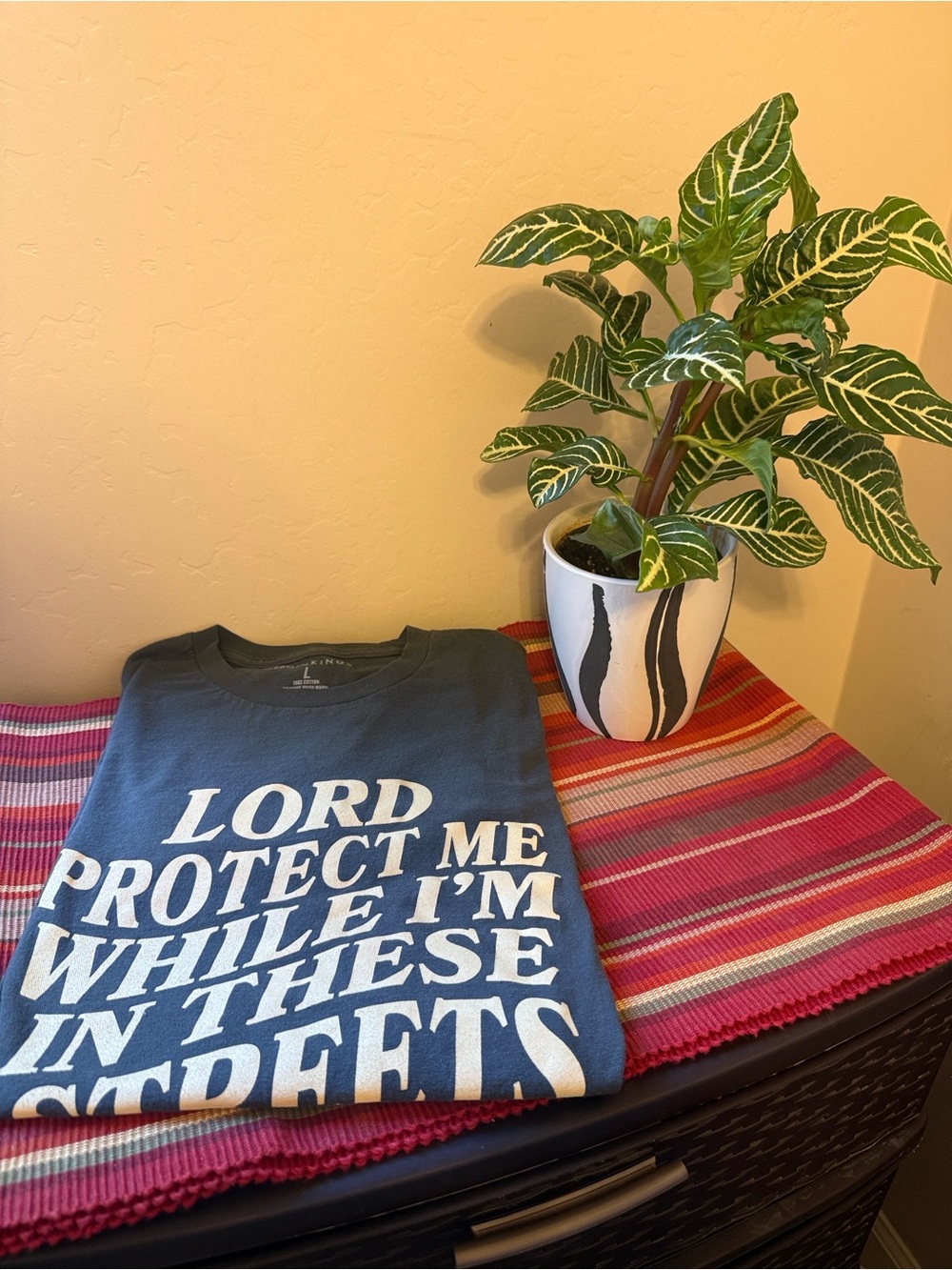 Graphic Black T-Shirt with Gold Lettering